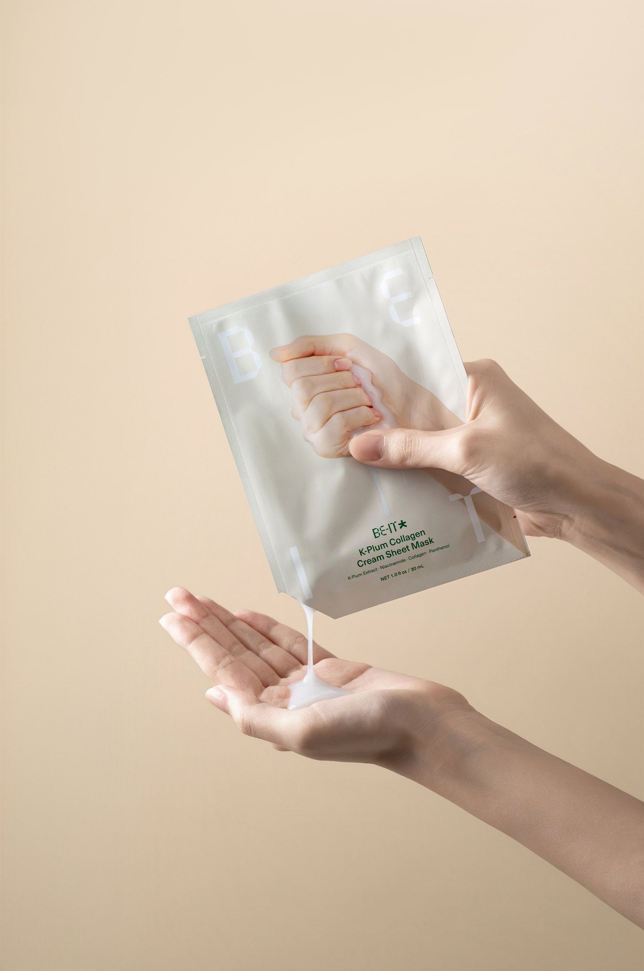 Hand holding a BE-IT creamy sheet mask pouch